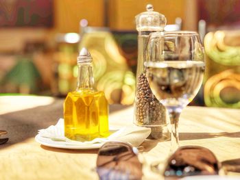 Close-up of beer glass on table