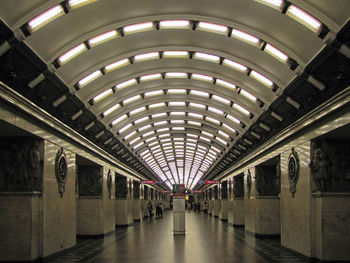 Interior of illuminated railroad station