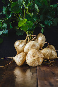 Bunch of yams on wooden table