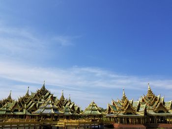 Low angle view of temple against blue sky