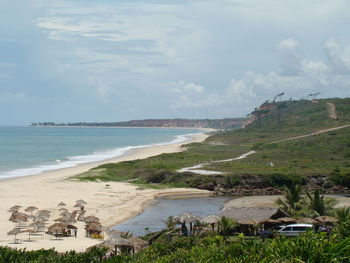 Scenic view of beach against sky