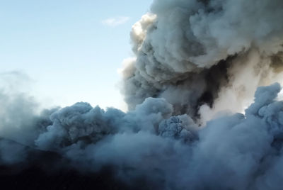 Scenic view of volcanic mountain against sky