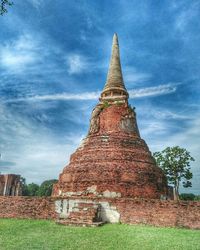 View of temple against cloudy sky