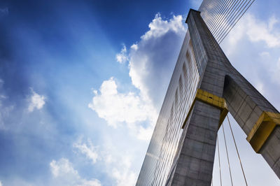 Low angle view of rama viii bridge against sky in city