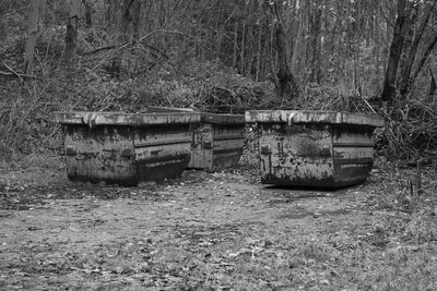 Abandoned boat on field