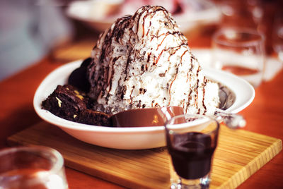 Close-up of ice cream served on table