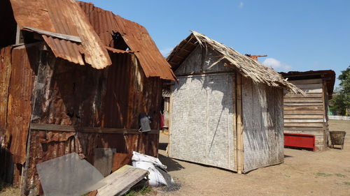 Old wooden house against sky