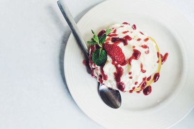 High angle view of ice cream in plate on table