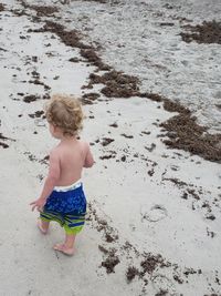 High angle view of boy on beach