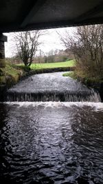 Scenic view of river against sky