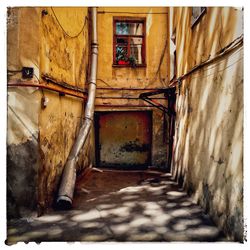Narrow alley amidst old building