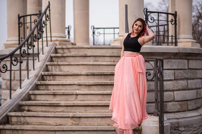 Portrait of woman on staircase