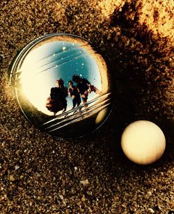 Close-up of pebbles in water