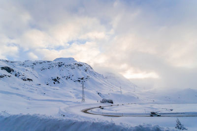 Snow covered mountain against sky