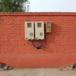 Brick wall and electricity box