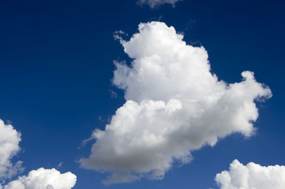 Low angle view of clouds in blue sky