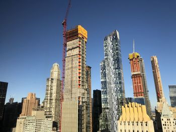 Low angle view of buildings against clear sky