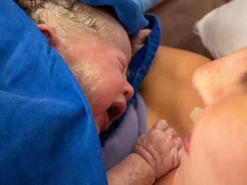 Mother daughter shortly after birth at hospital.