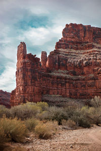 View of rock formations on landscape against sky