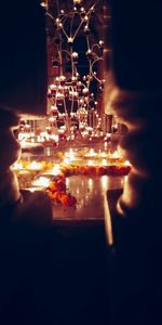 Close-up of illuminated christmas tree at night