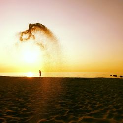 Scenic view of sea at sunset