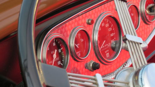 Close-up of red vintage car