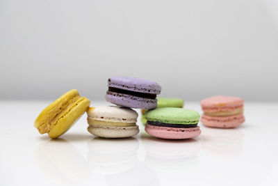 Close-up of cupcakes on table against white background