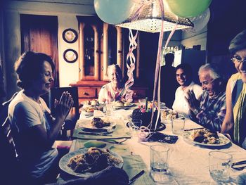 People sitting on dining table