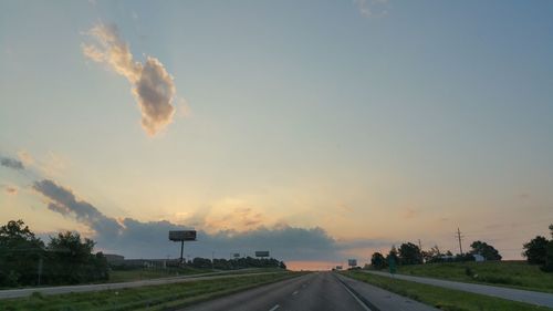 Road against sky during sunset