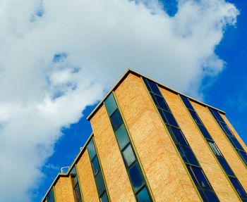 Low angle view of built structure against blue sky