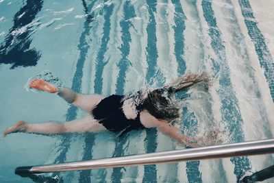 High angle view of woman in swimming pool