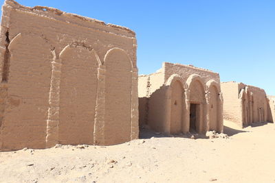 Old ruins of building against clear sky