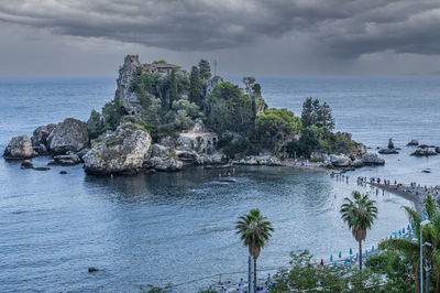 The beautiful isola bella in taormina before a storm