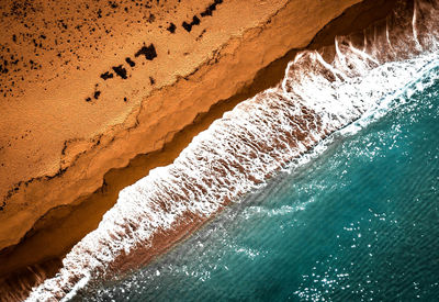 High angle view of rock formation in sea