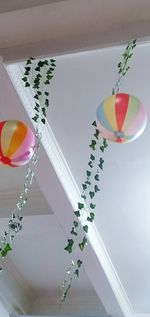 Close-up of multi colored balloons on table