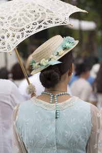 Rear view of woman wearing hat