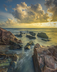 Scenic view of sea against sky during sunset