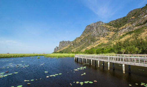 Scenic view of lake against blue sky