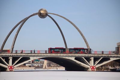 Low angle view of bridge against clear sky