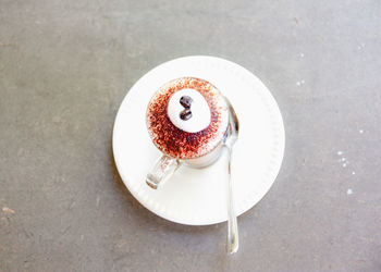High angle view of coffee cup on table