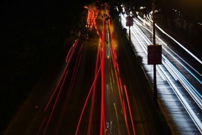 High angle view of light trails on street at night