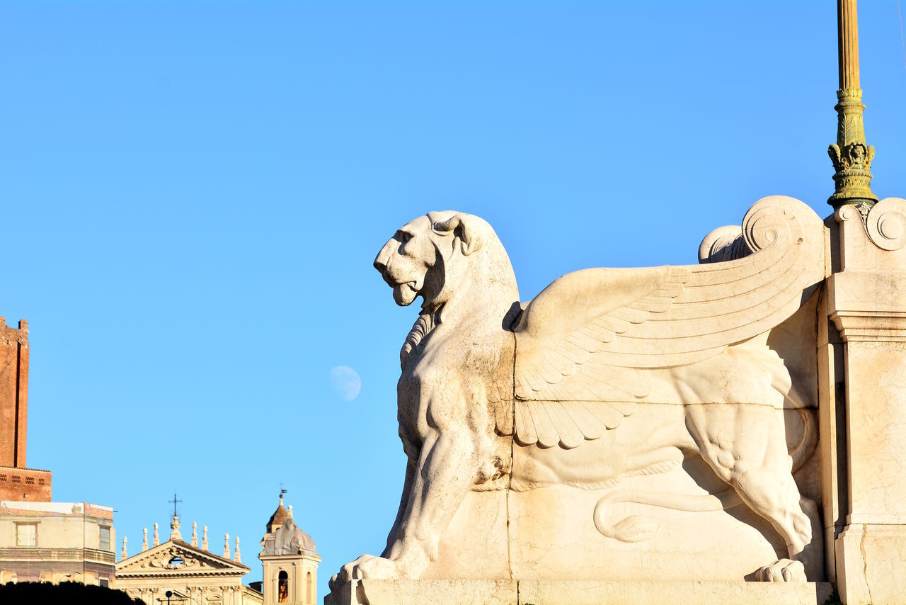 LOW ANGLE VIEW OF STATUE AGAINST CLEAR SKY