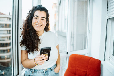 Young woman using mobile phone