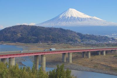 Scenic view of lake with mountains in background