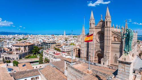 Aerial view of the spanish flag near the la seu in mallorca, spain.