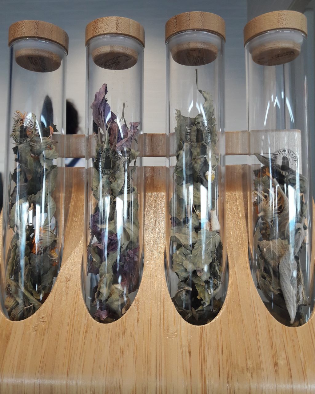 glass - material, indoors, transparent, reflection, no people, hanging, wood - material, choice, still life, hardwood floor, shoe, healthcare and medicine, retail, art and craft, variation, fashion, day, animal themes, table