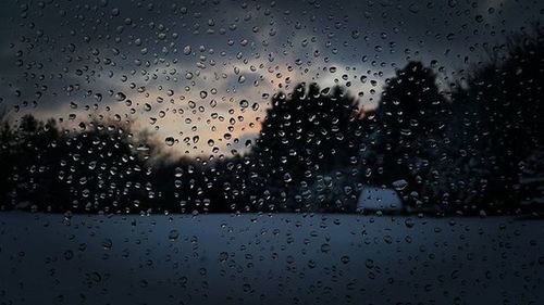 Close-up of water drops on glass