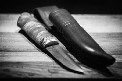 Close-up of human feet on table