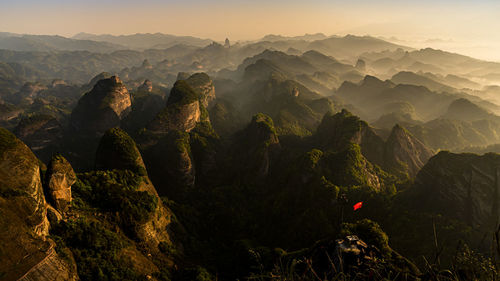 Scenic view of mountains against sky during sunset