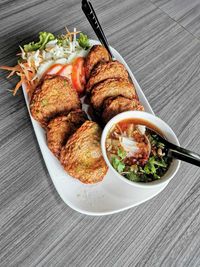 High angle view of meal served on table